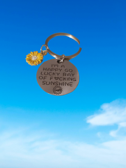 "I'M A HAPPY GO LUCKY RAY OF FUCKING SUNSHINE" Silver Round Tag with Flower Charm